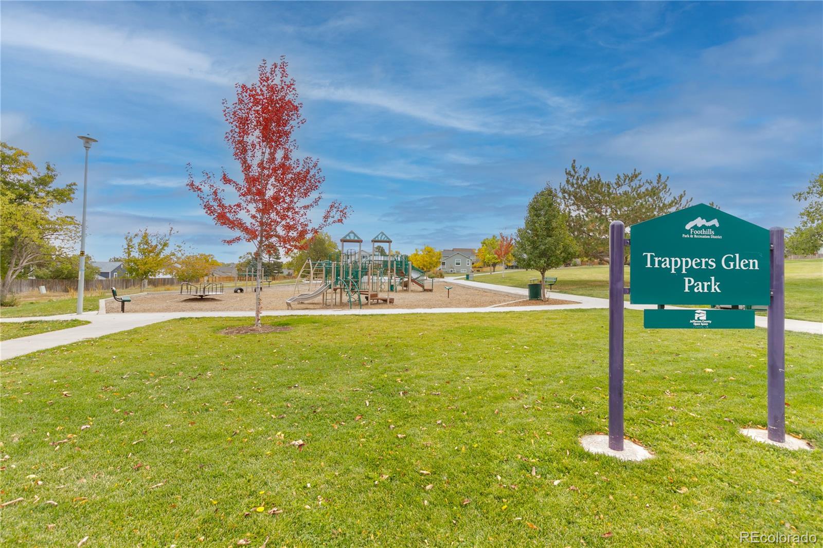 11841 West Dumbarton Drive Morrison, CO 80465 - Photo 40 of 45 a view of a street with yard