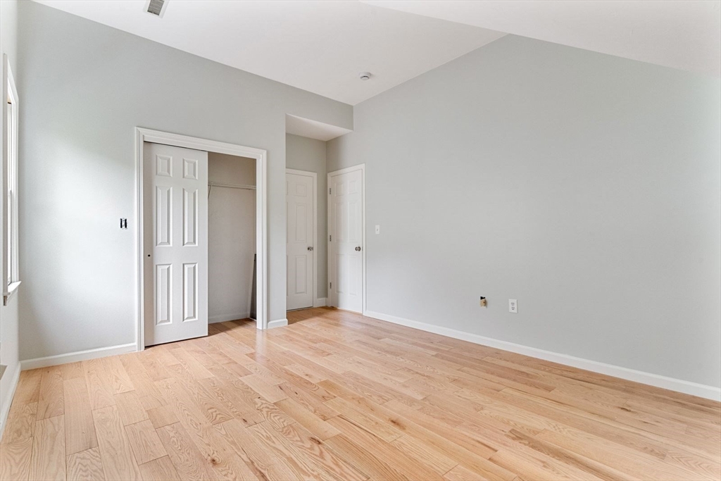 20 Dudley Road Wayland, MA 01778 - Photo 12 of 27 a view of an empty room with wooden floor