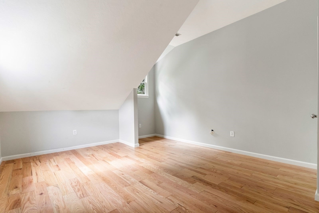 20 Dudley Road Wayland, MA 01778 - Photo 16 of 27 a view of an empty room with wooden floor