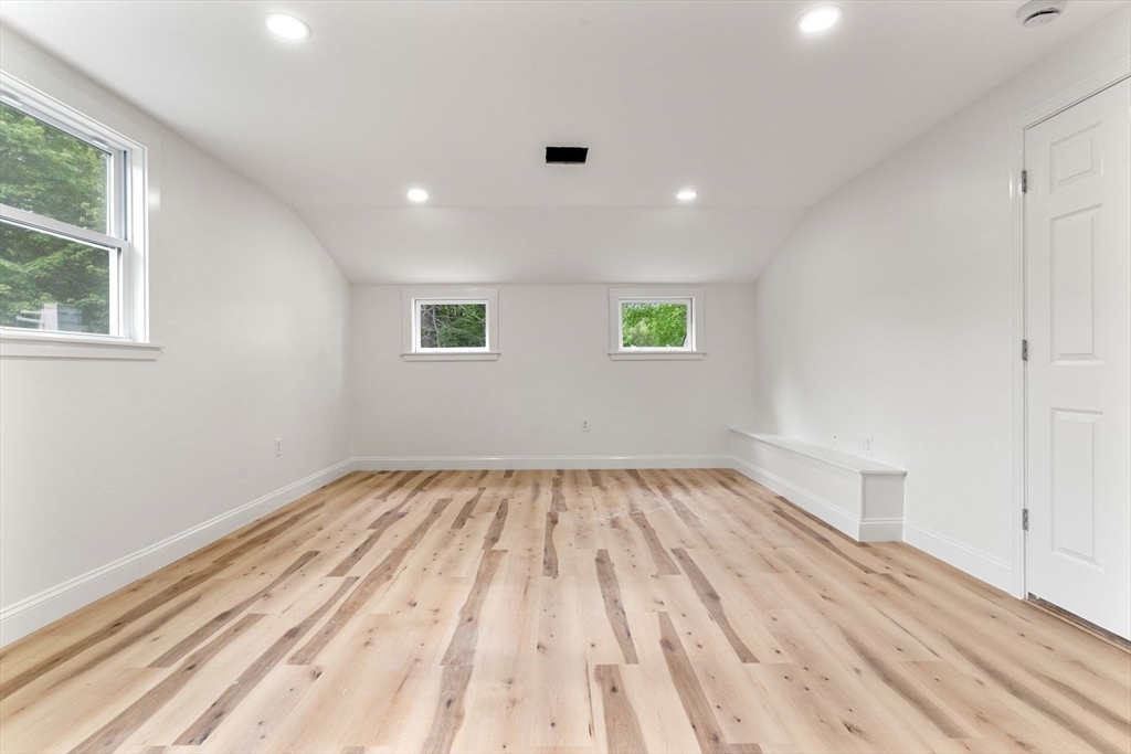 20 Dudley Road Wayland, MA 01778 - Photo 20 of 27 a view of empty room with wooden floor and fan