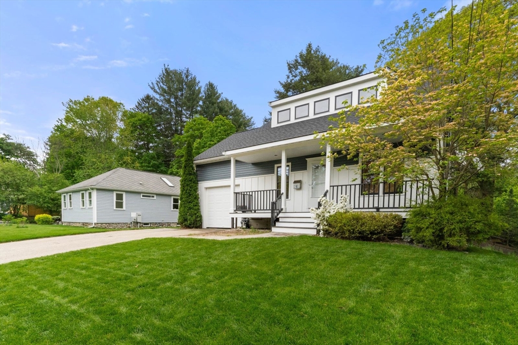 20 Dudley Road Wayland, MA 01778 - Photo 27 of 27 a front view of a house with a yard and green space