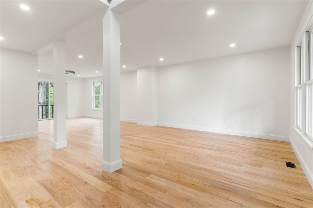 20 Dudley Road Wayland, MA 01778 - Photo 7 of 27 a view of a hallway with wooden floor
