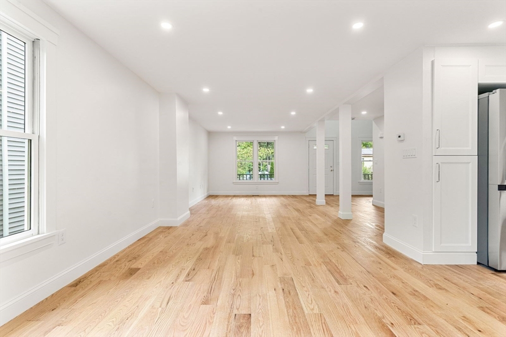 20 Dudley Road Wayland, MA 01778 - Photo 8 of 27 a view of an empty room and window