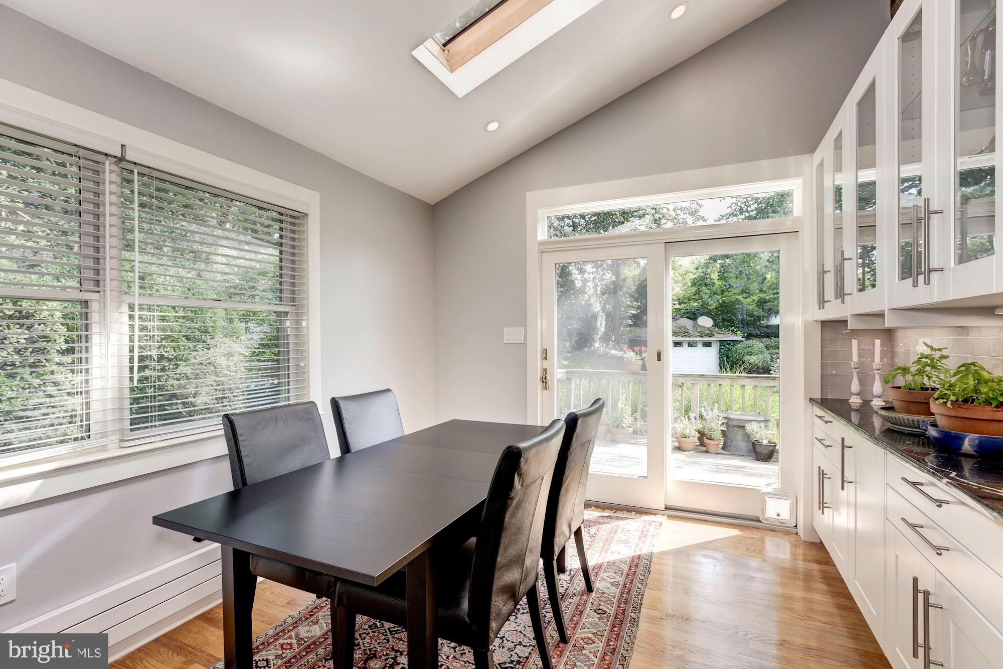 6212 Walhonding Road Bethesda, MD 20816 - Photo 28 of 60 View to glass doors opening to large deck
