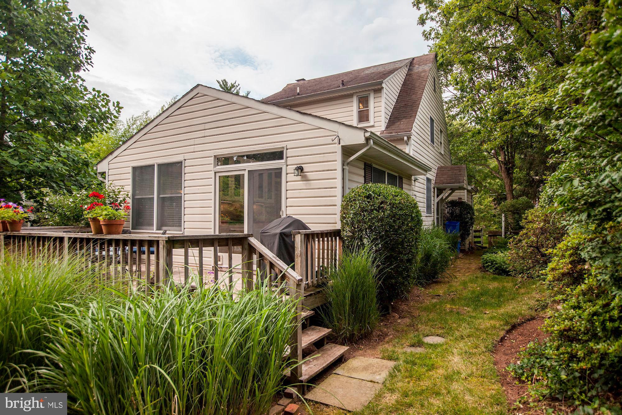 6212 Walhonding Road Bethesda, MD 20816 - Photo 52 of 60 Back of Home w/grasses and large deck