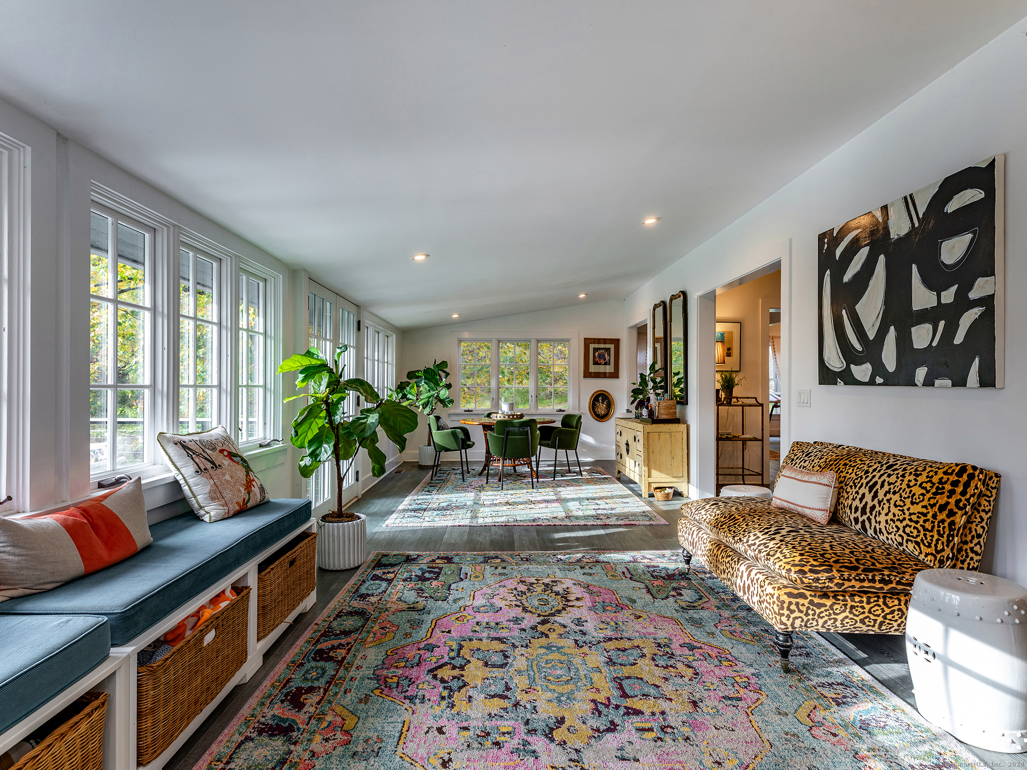 379 Lake Road Warren, CT 06777 - Photo 14 of 36 a living room with furniture and a potted plant