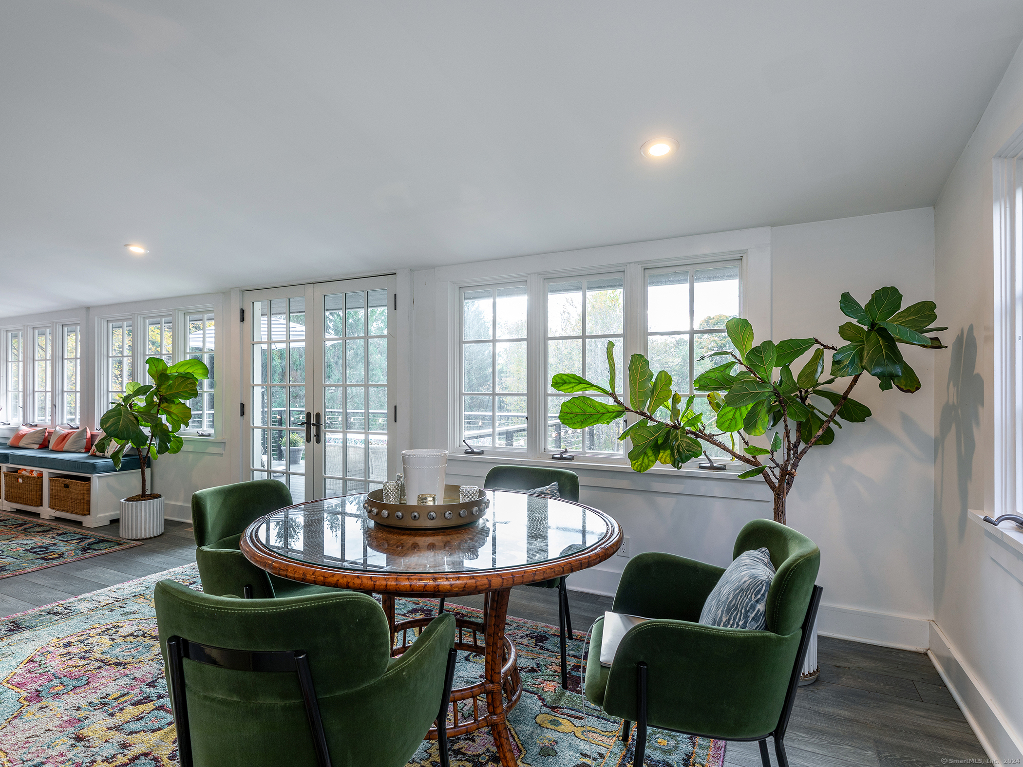 379 Lake Road Warren, CT 06777 - Photo 15 of 36 a living room with furniture potted plant and a potted plant