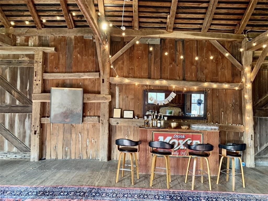 379 Lake Road Warren, CT 06777 - Photo 36 of 36 a view of dinning table and chairs in a patio