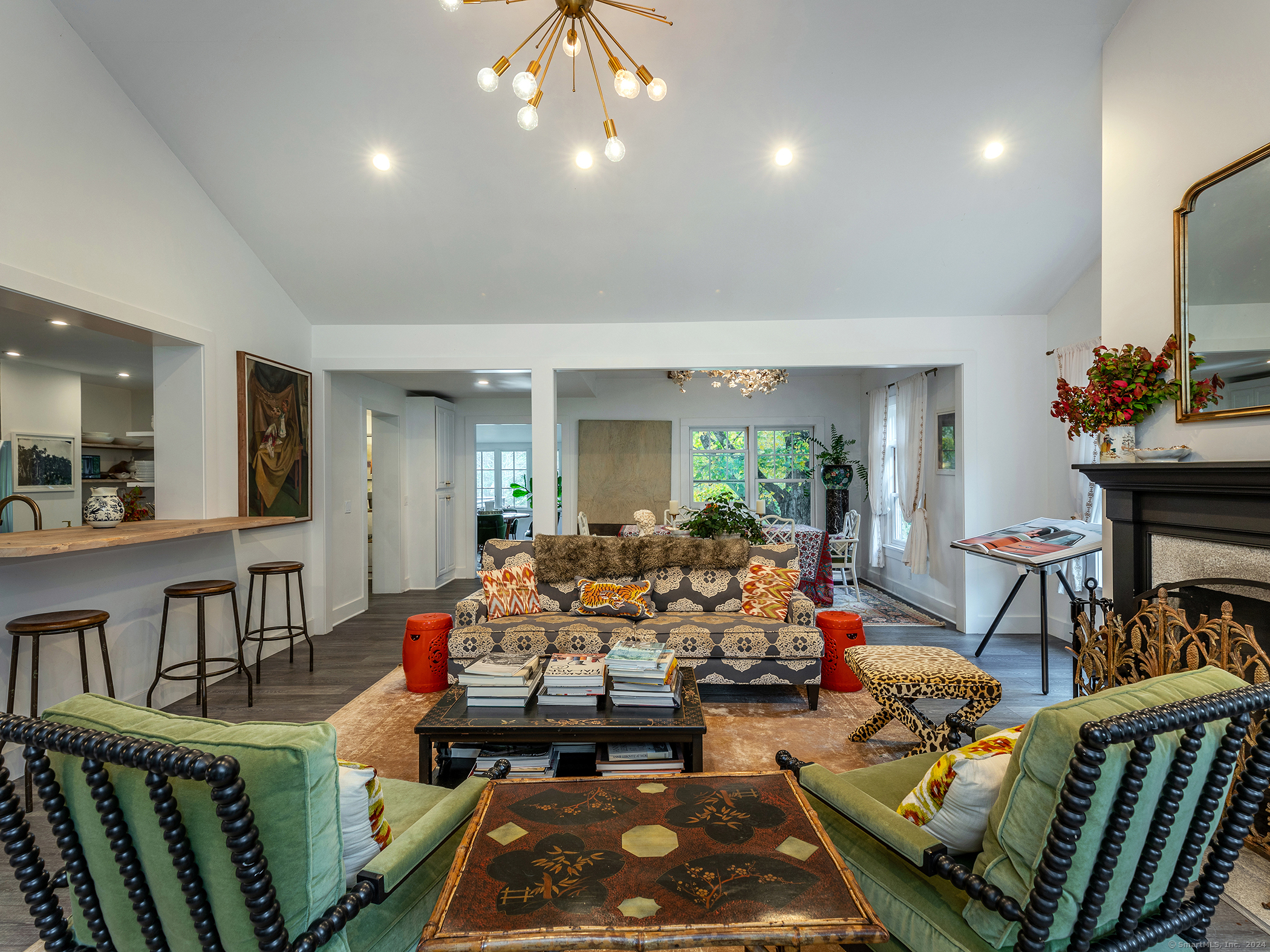 379 Lake Road Warren, CT 06777 - Photo 10 of 36 a living room with furniture and a wooden floor