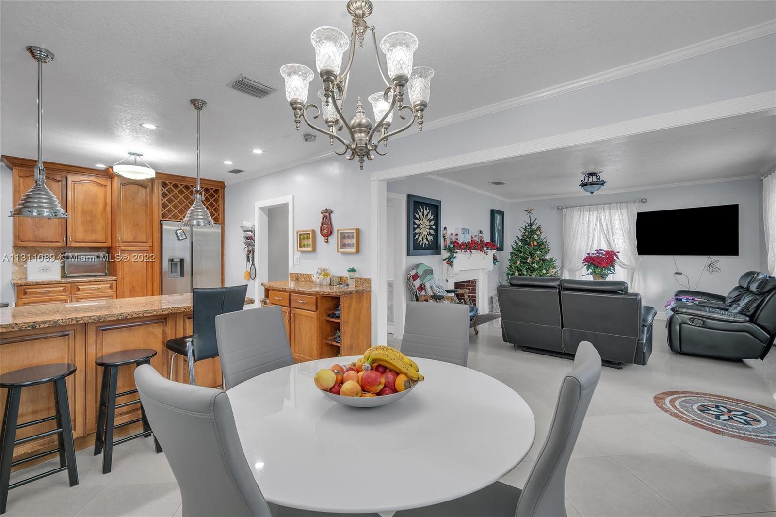 Allapattah Miami, FL 33125 - Photo 11 of 37 a living room with furniture and a flat screen tv