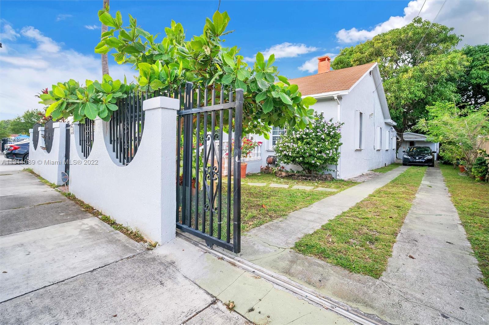Allapattah Miami, FL 33125 - Photo 6 of 37 a view of a house with a yard