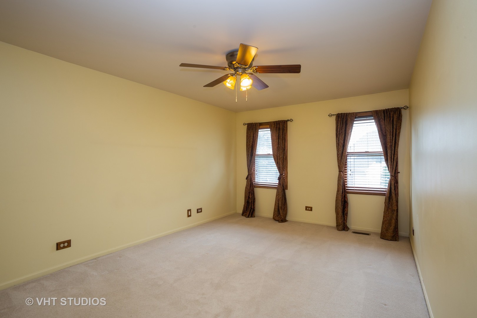 67 Bright Ridge Drive Schaumburg, IL 60194 - Photo 11 of 16 a view of an empty room with window and chandelier fan