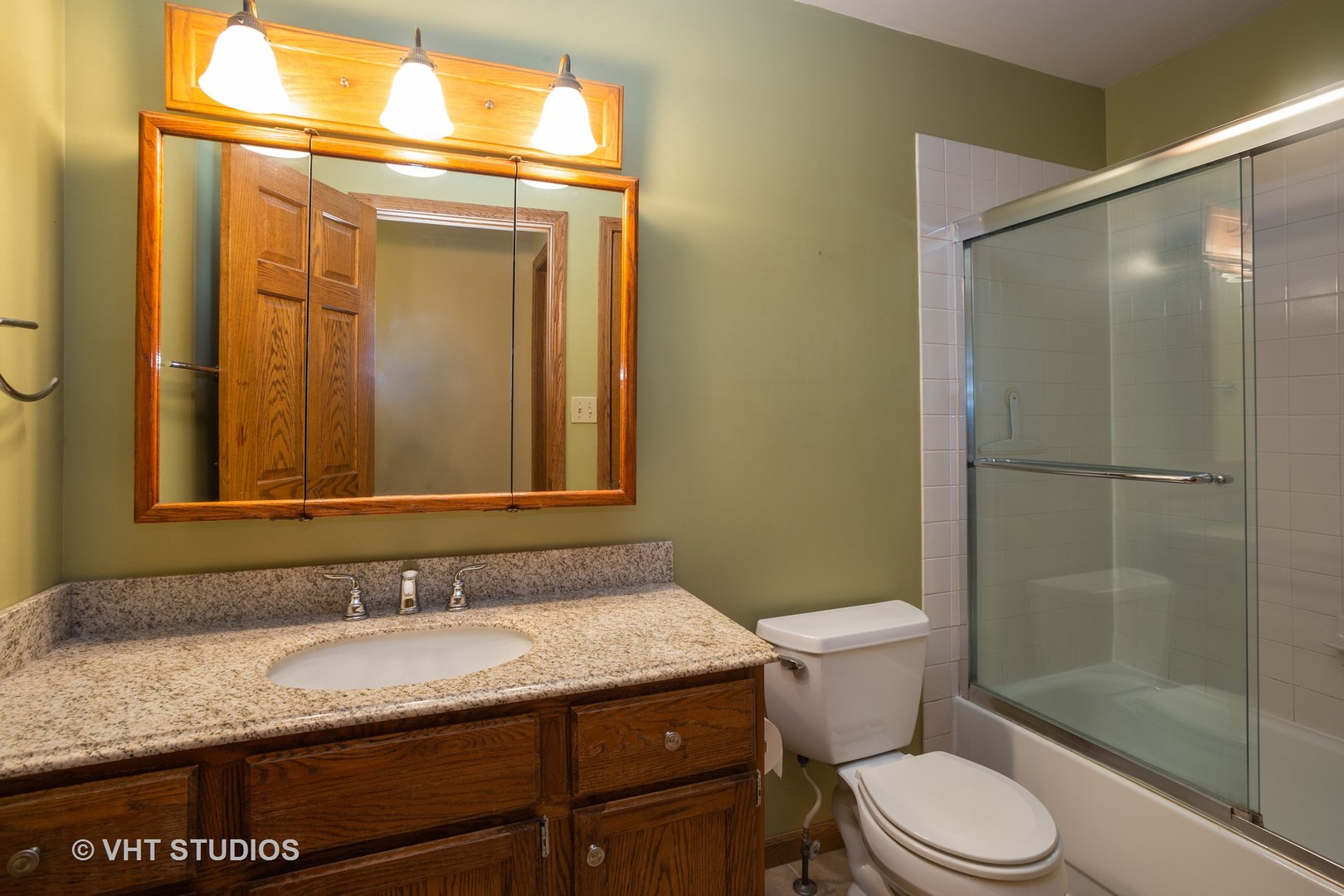 67 Bright Ridge Drive Schaumburg, IL 60194 - Photo 13 of 16 a bathroom with a granite countertop sink toilet and shower