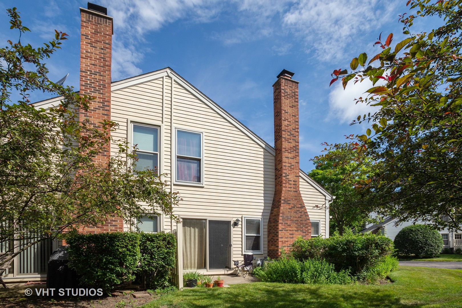67 Bright Ridge Drive Schaumburg, IL 60194 - Photo 16 of 16 a front view of a house with garden