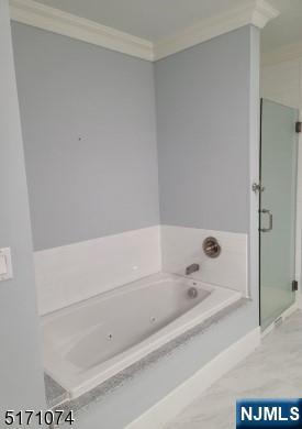 10 Lower Notch Road, Unit 8 Woodland Park, NJ 07424 - Photo 7 of 19 a bathroom with a bathtub and shower