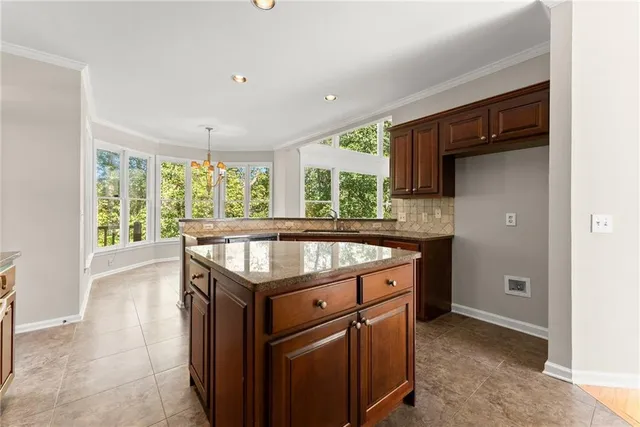 a view of balcony with wooden floor