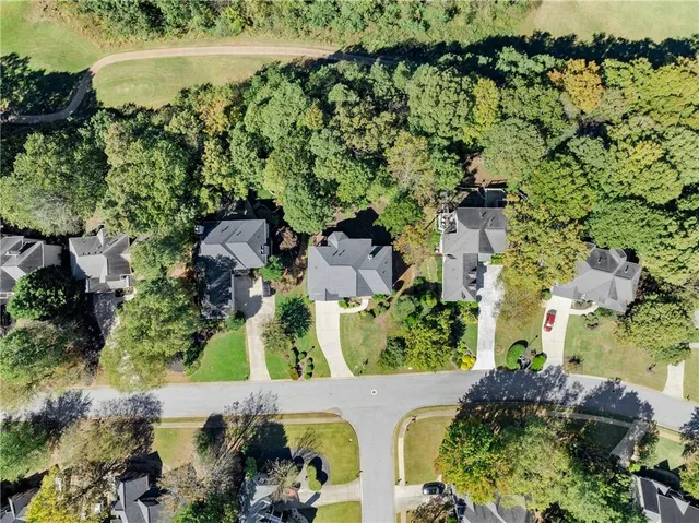 an aerial view of a city with lots of residential buildings