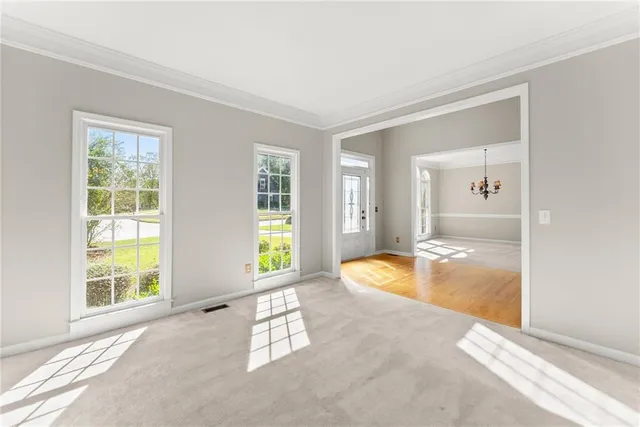 a view of an empty room with a window