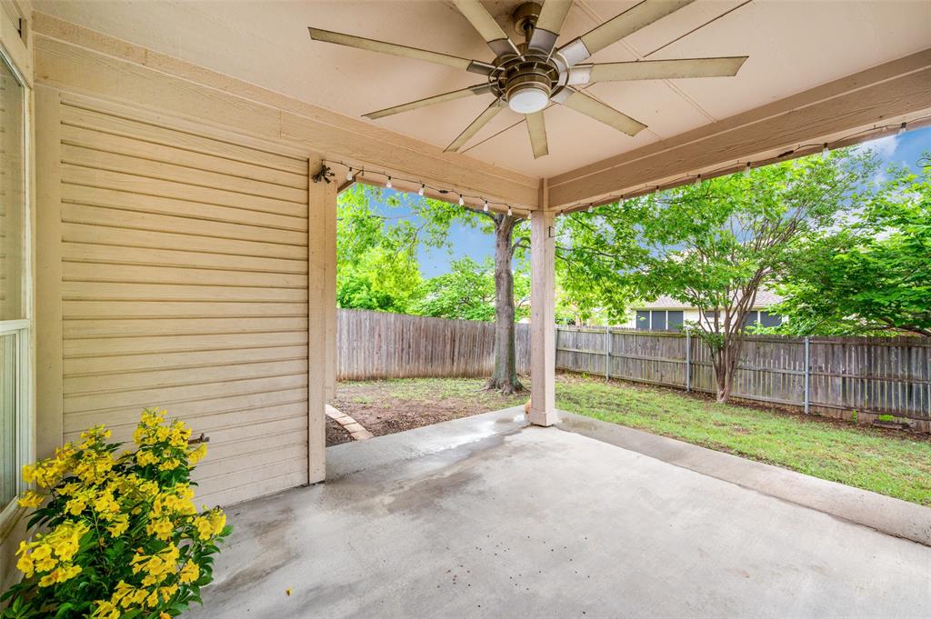 7306 Vista Ridge Lane Sachse, TX 75048 - Photo 22 of 23 a view of a backyard with a garden