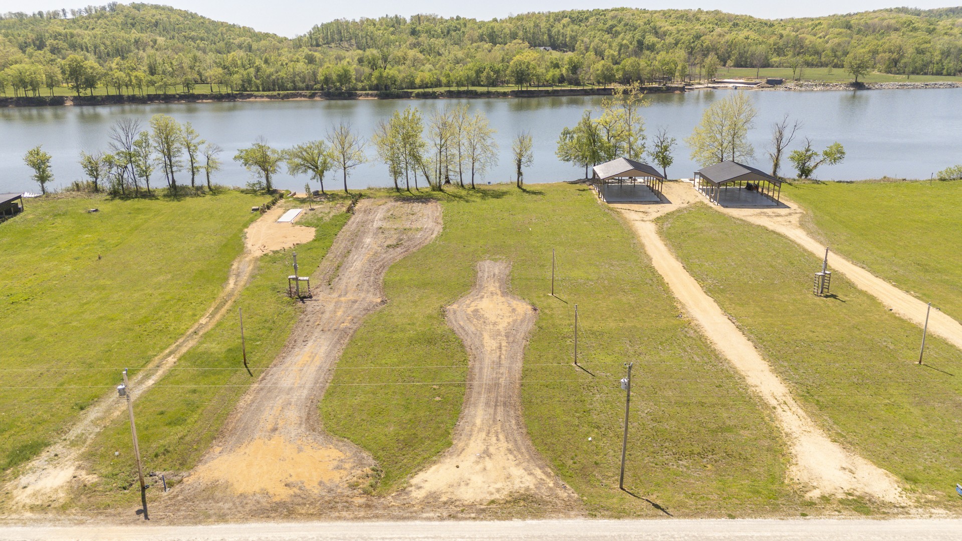 a view of a swimming pool with a lake view