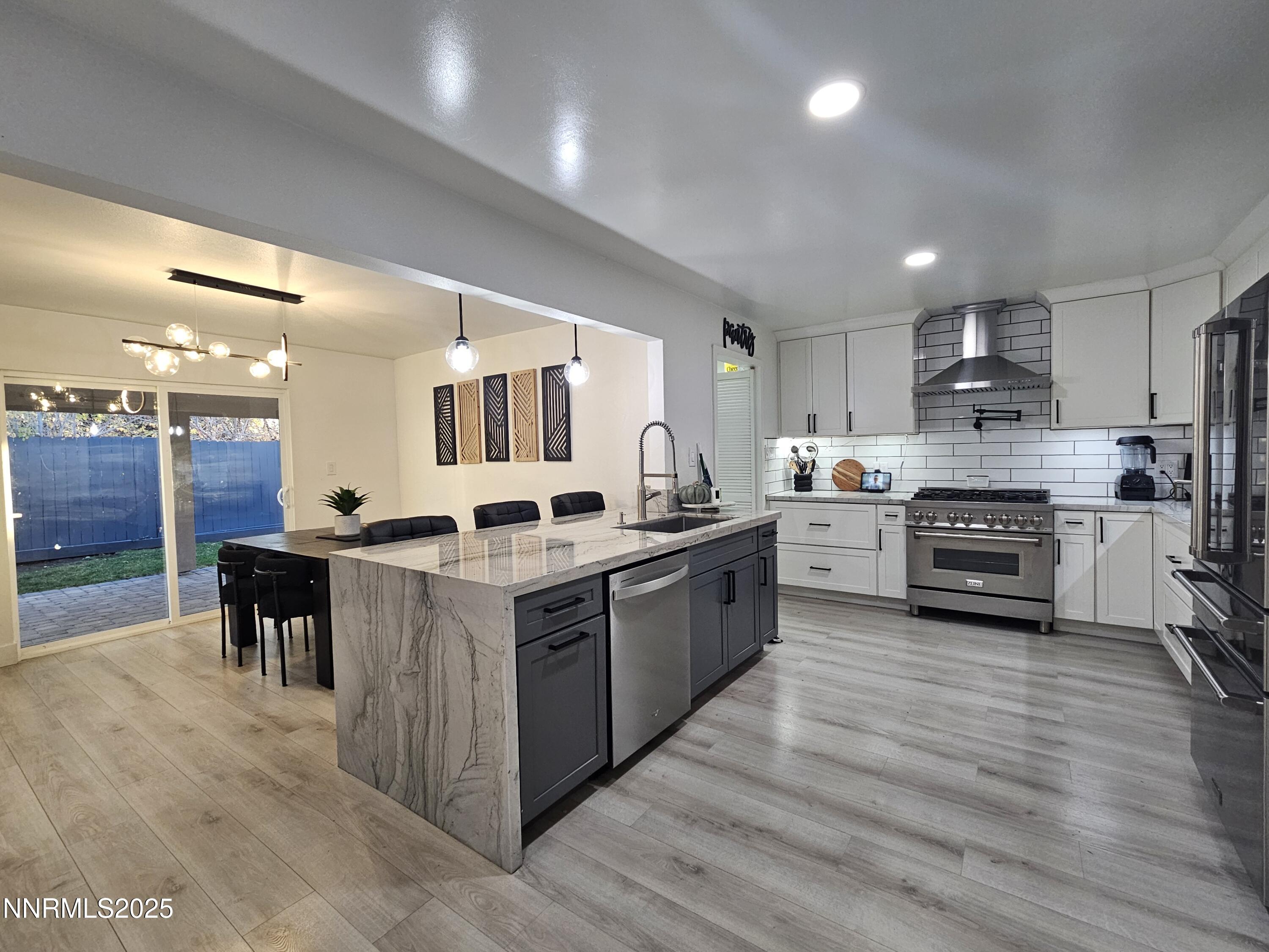 181 Quail Street Sparks, NV 89431 - Photo 14 of 42 a large kitchen with stainless steel appliances lots of counter top space