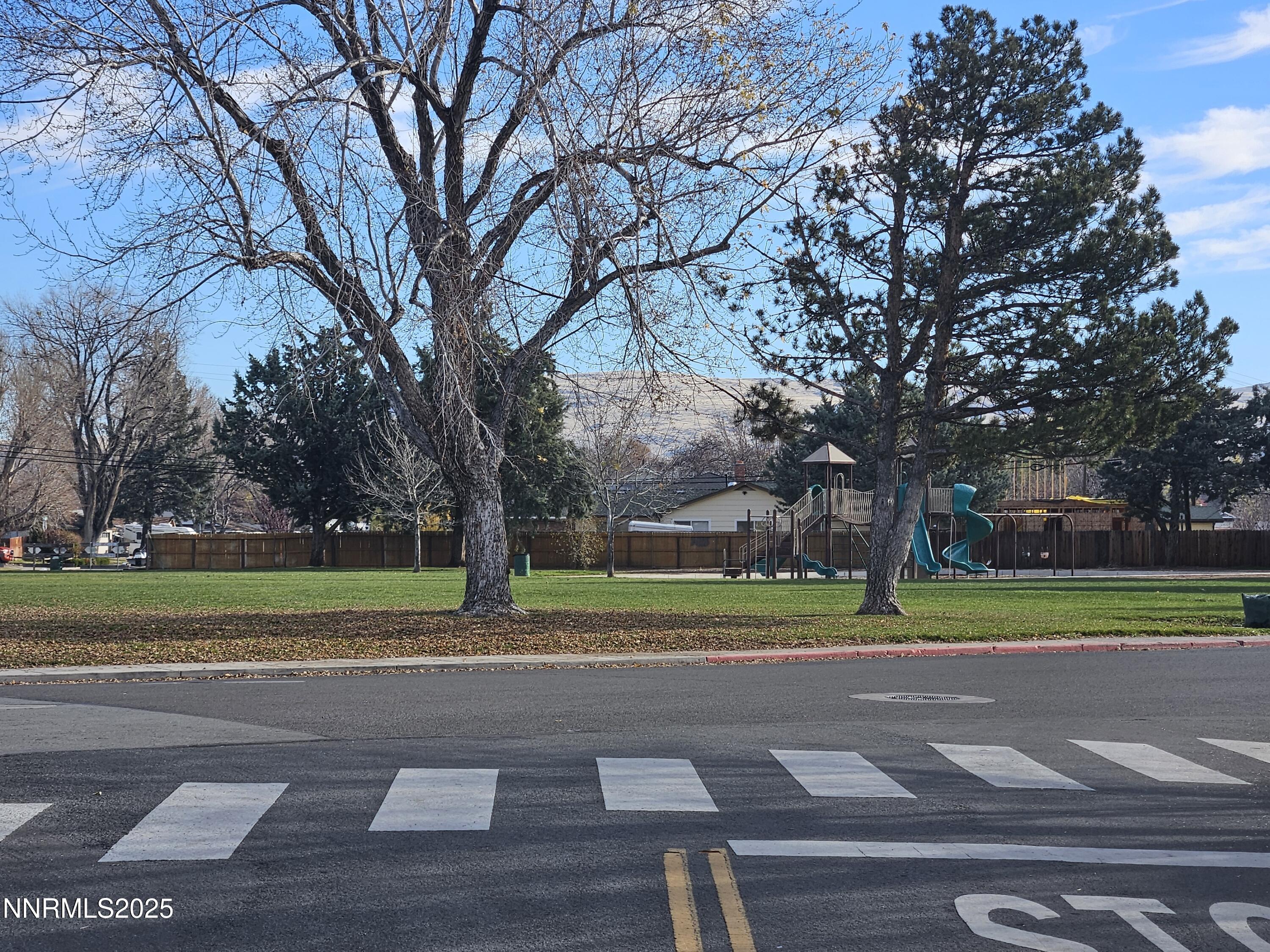 181 Quail Street Sparks, NV 89431 - Photo 3 of 42 a view of a park and trees