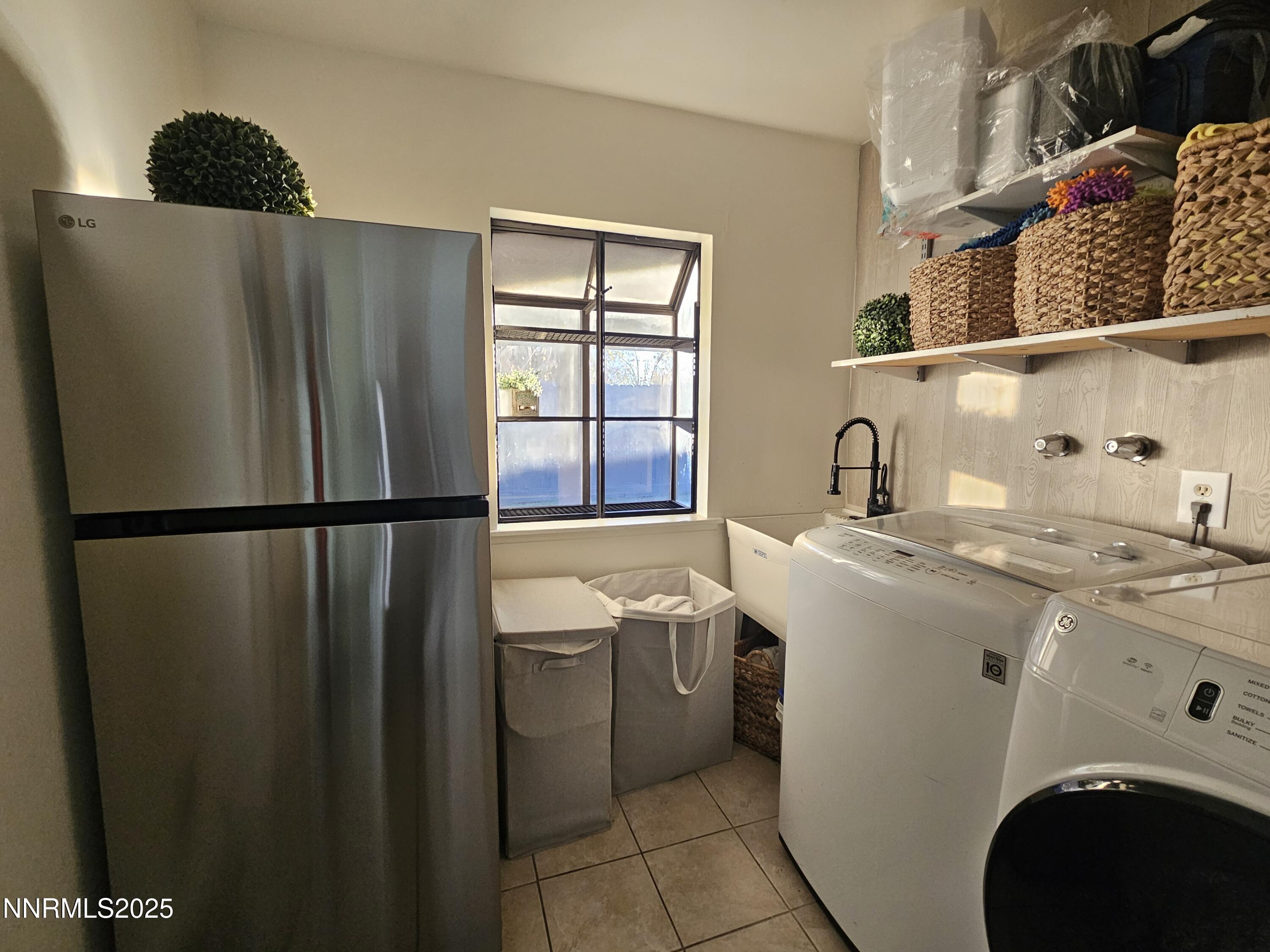 181 Quail Street Sparks, NV 89431 - Photo 37 of 42 a utility room with dryer and washer