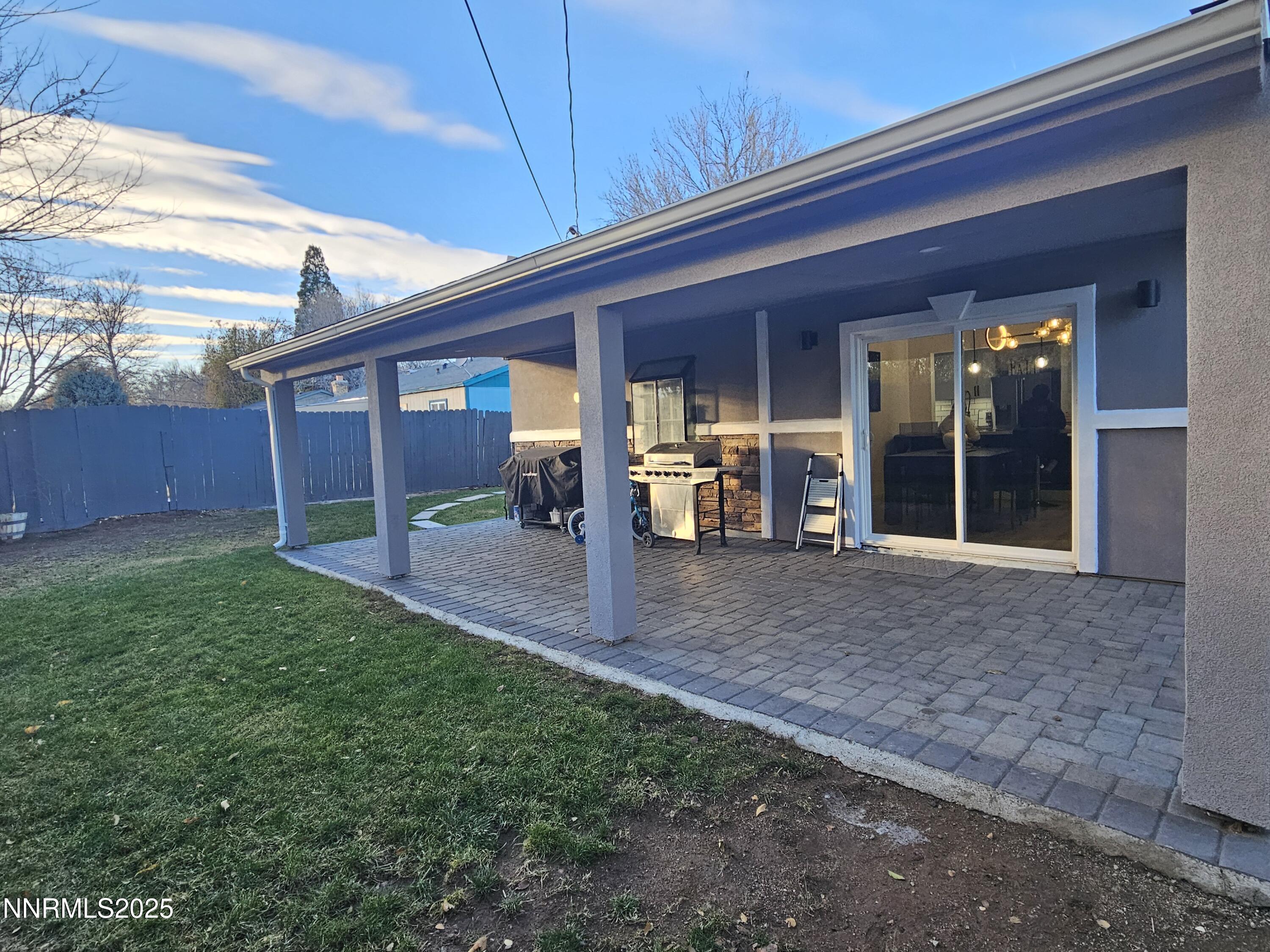 181 Quail Street Sparks, NV 89431 - Photo 41 of 42 a view of a house with backyard porch and sitting area
