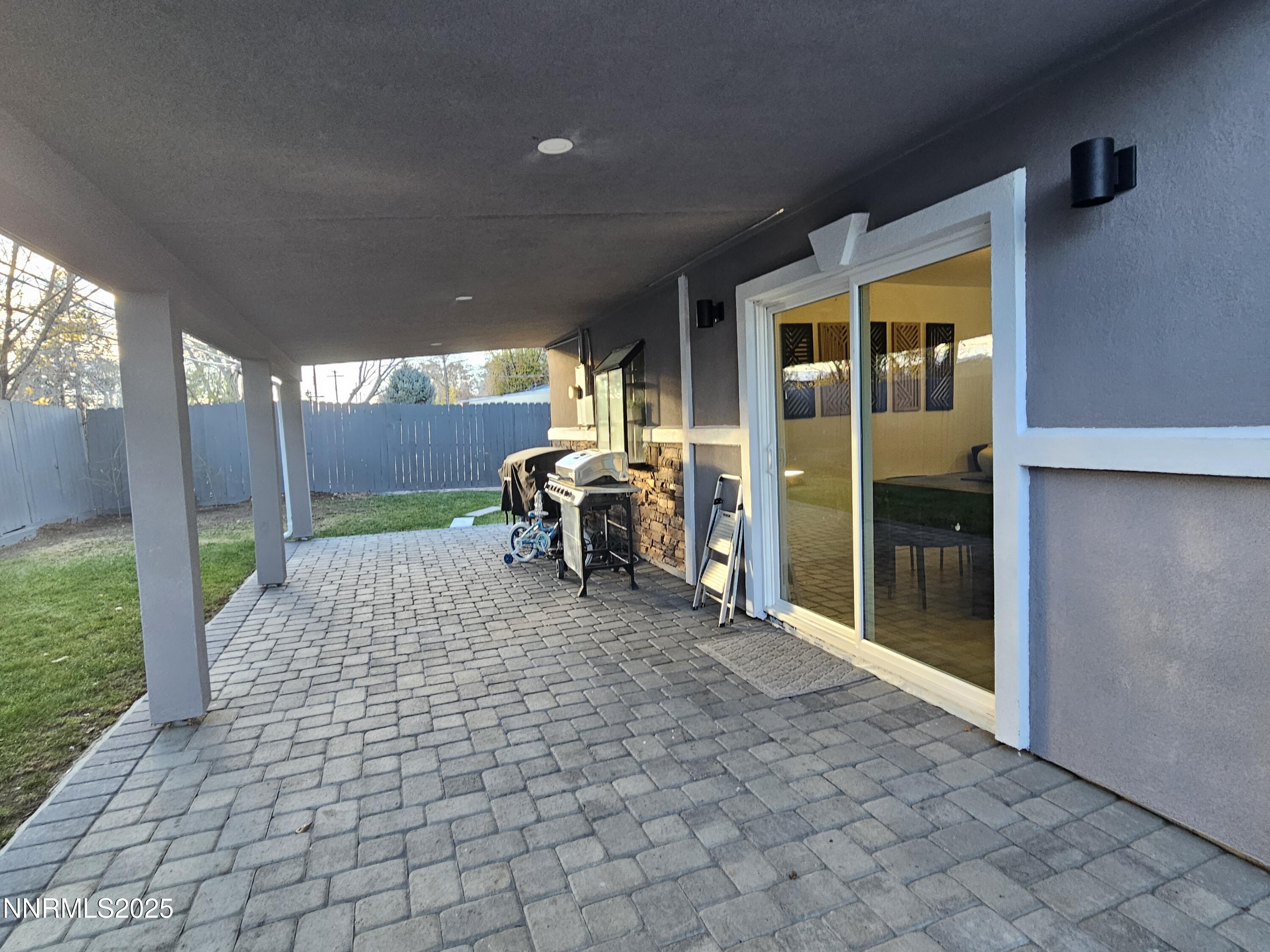 181 Quail Street Sparks, NV 89431 - Photo 42 of 42 a view of a porch with chairs and backyard