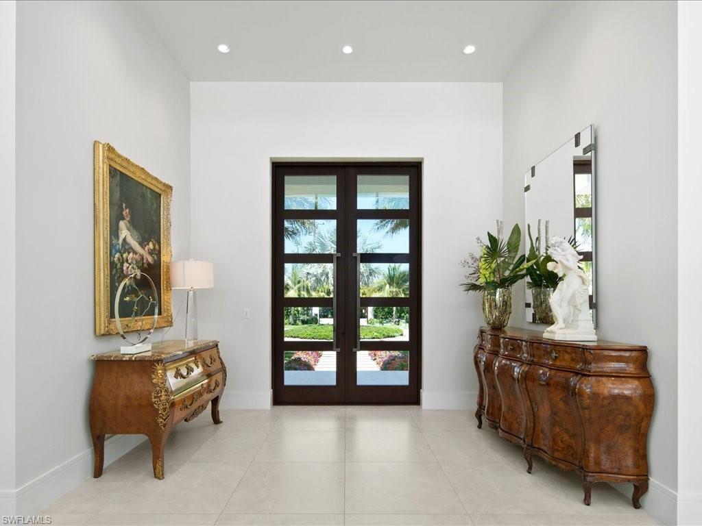 172 Center Street Naples, FL 34108 - Photo 13 of 50 a living room with furniture and a window