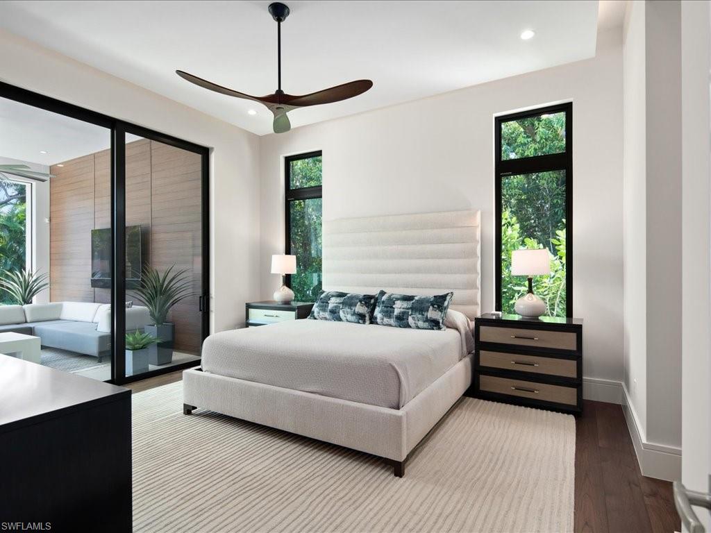 172 Center Street Naples, FL 34108 - Photo 28 of 50 a bedroom with a bed and a window