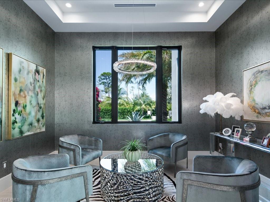 172 Center Street Naples, FL 34108 - Photo 36 of 50 a kitchen with a table and chairs