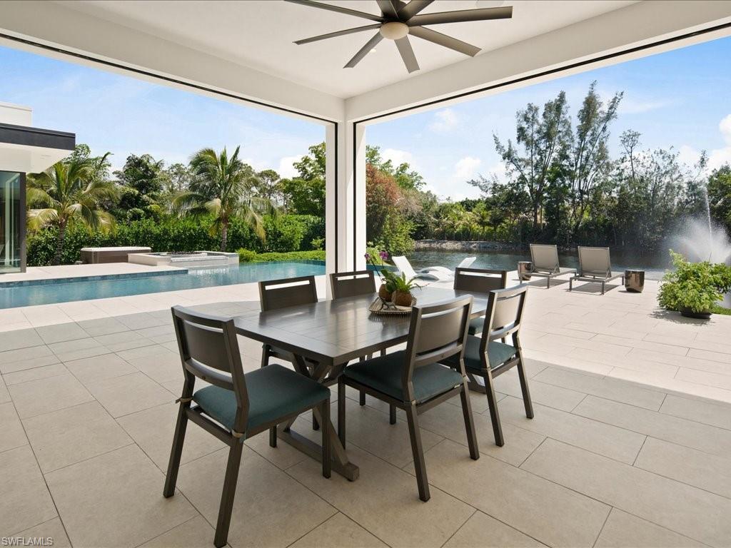 172 Center Street Naples, FL 34108 - Photo 41 of 50 a view of an outdoor dining space with furniture