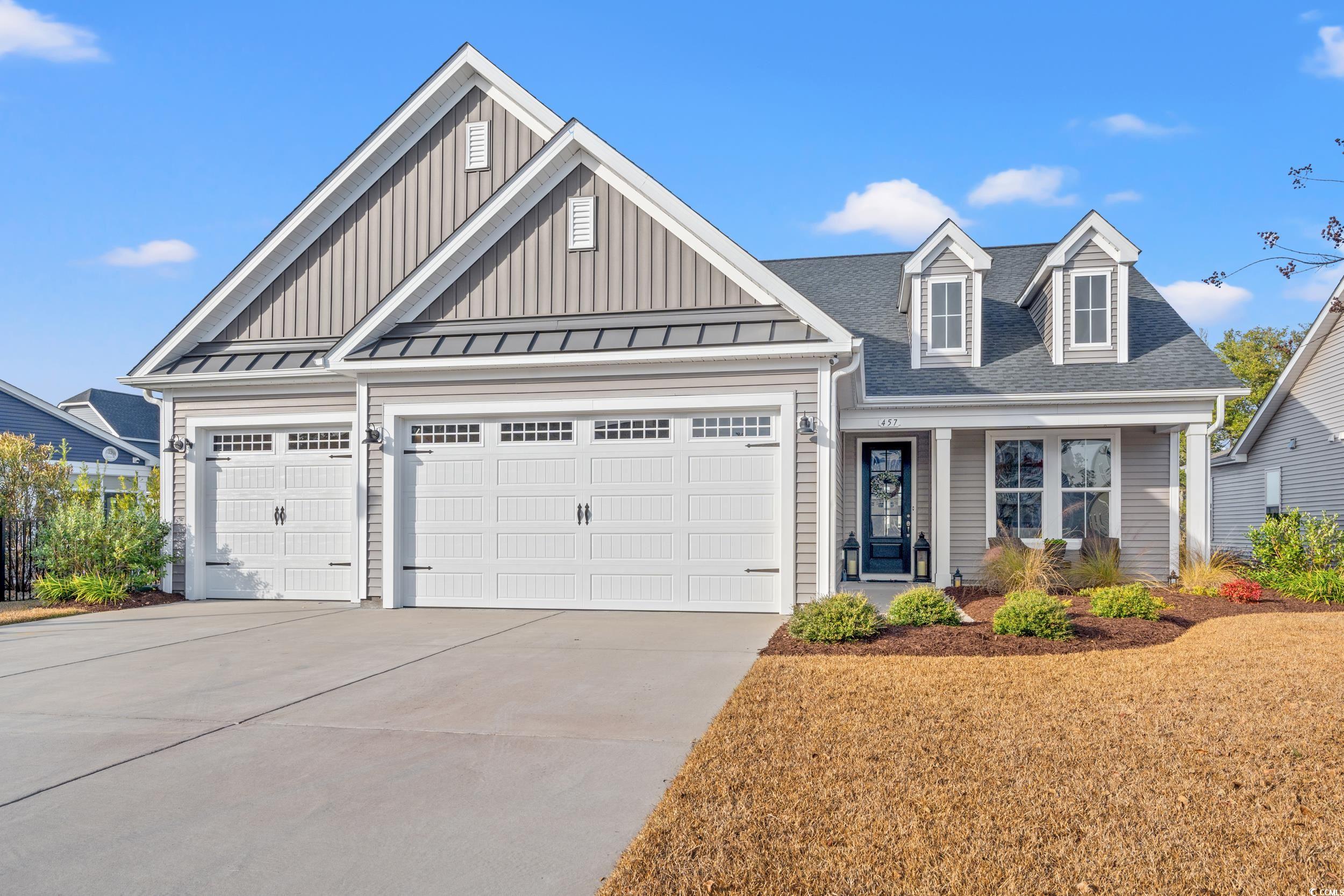 457 Cascade Loop Little River, SC 29566 - Photo 1 of 40 View of front facade featuring a garage