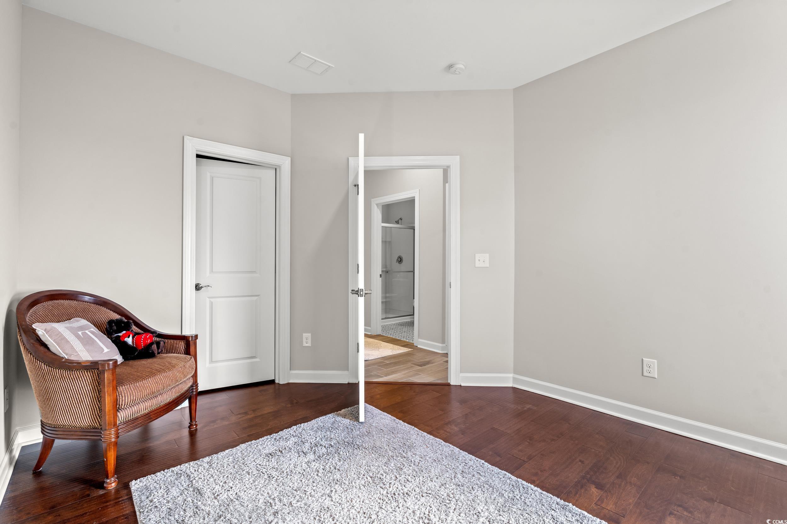 457 Cascade Loop Little River, SC 29566 - Photo 18 of 40 Bedroom featuring dark wood-type flooring