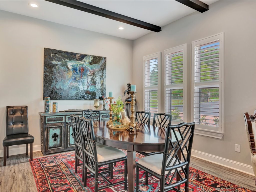 104 Wheeler Road Lufkin, TX 75901 - Photo 13 of 45 a view of a dining room with furniture window and wooden floor