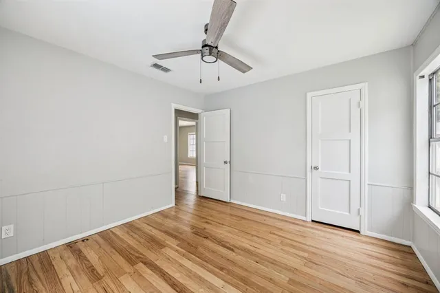 a view of a livingroom with wooden floor