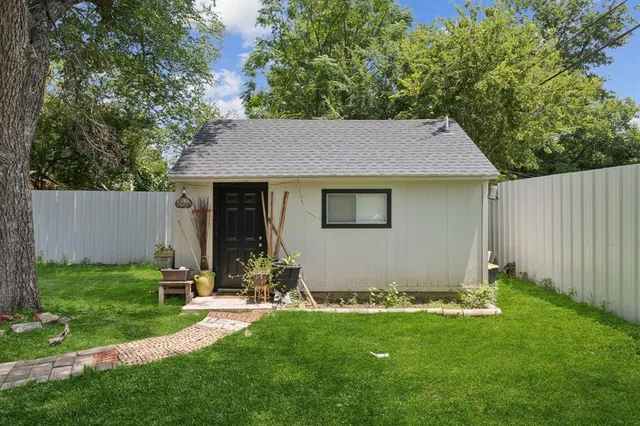 a view of a backyard with a garden