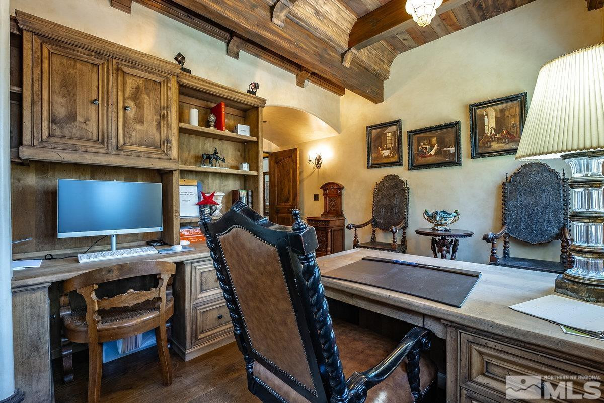 190 Yellow Jacket Road Glenbrook, NV 89413 - Photo 11 of 42 a room with furniture a flat screen tv and a chair