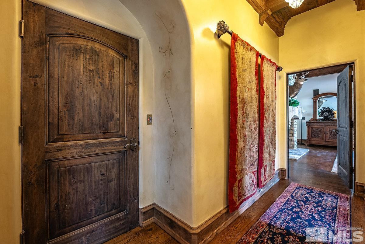 190 Yellow Jacket Road Glenbrook, NV 89413 - Photo 21 of 42 a view of hallway with wooden floor
