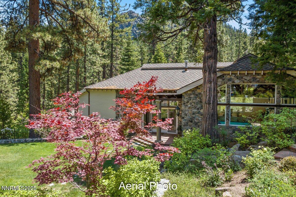 190 Yellow Jacket Road Glenbrook, NV 89413 - Photo 23 of 42 front view of a house with a yard