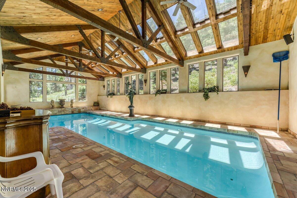 190 Yellow Jacket Road Glenbrook, NV 89413 - Photo 25 of 42 a view of swimming pool with outdoor seating
