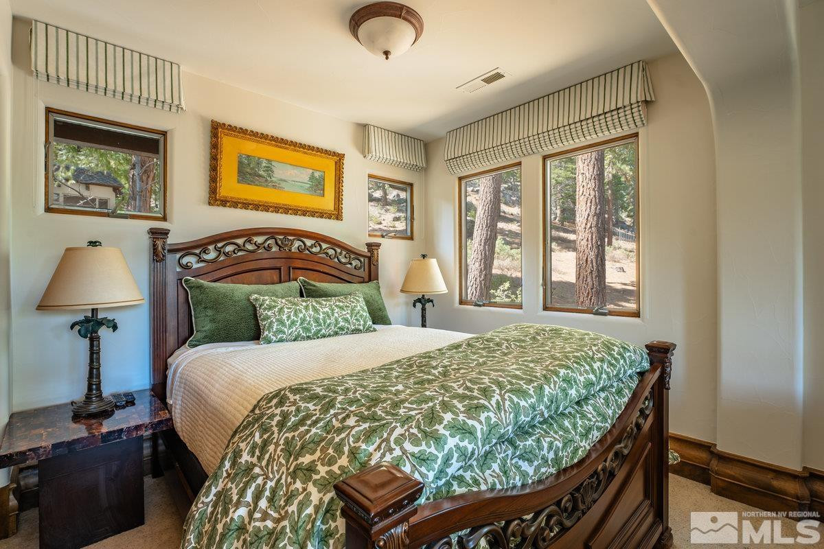 190 Yellow Jacket Road Glenbrook, NV 89413 - Photo 30 of 42 a bedroom with a bed and a window