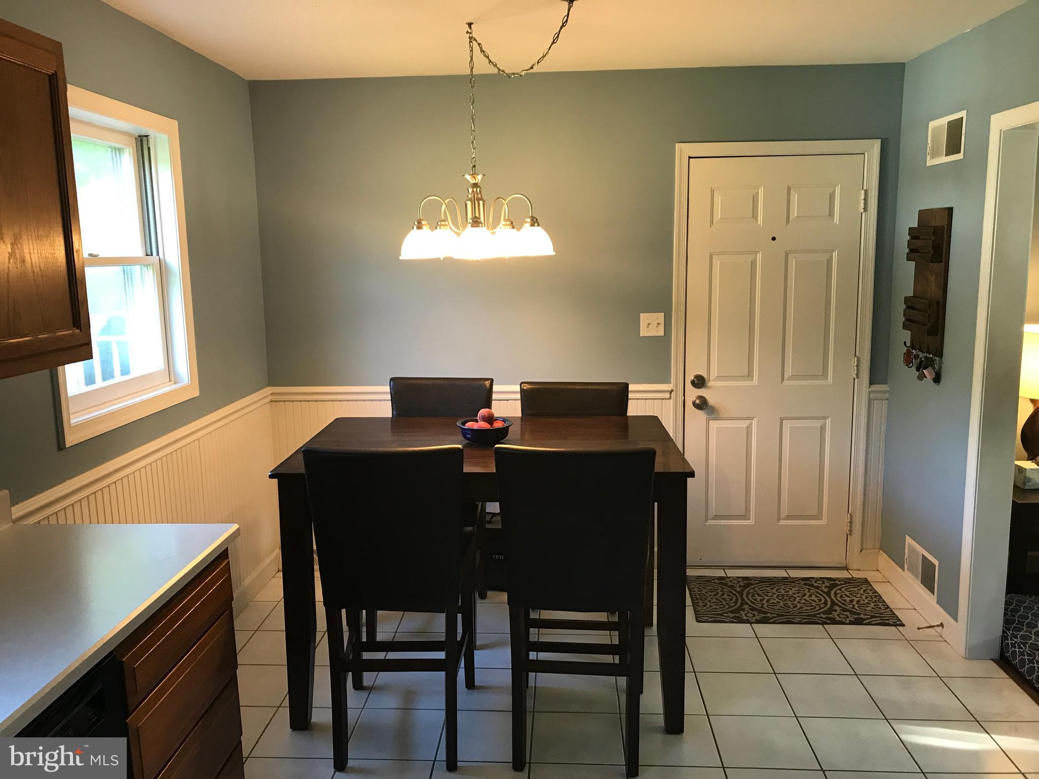 195 River Road Pequea, PA 17565 - Photo 16 of 77 a view of a dining room with furniture and chandelier