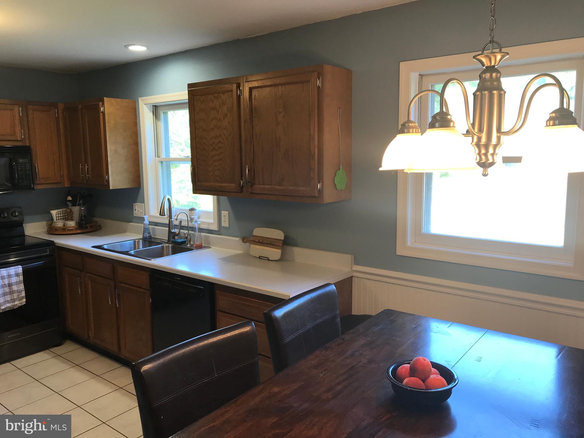 195 River Road Pequea, PA 17565 - Photo 18 of 77 a kitchen with a sink and cabinets