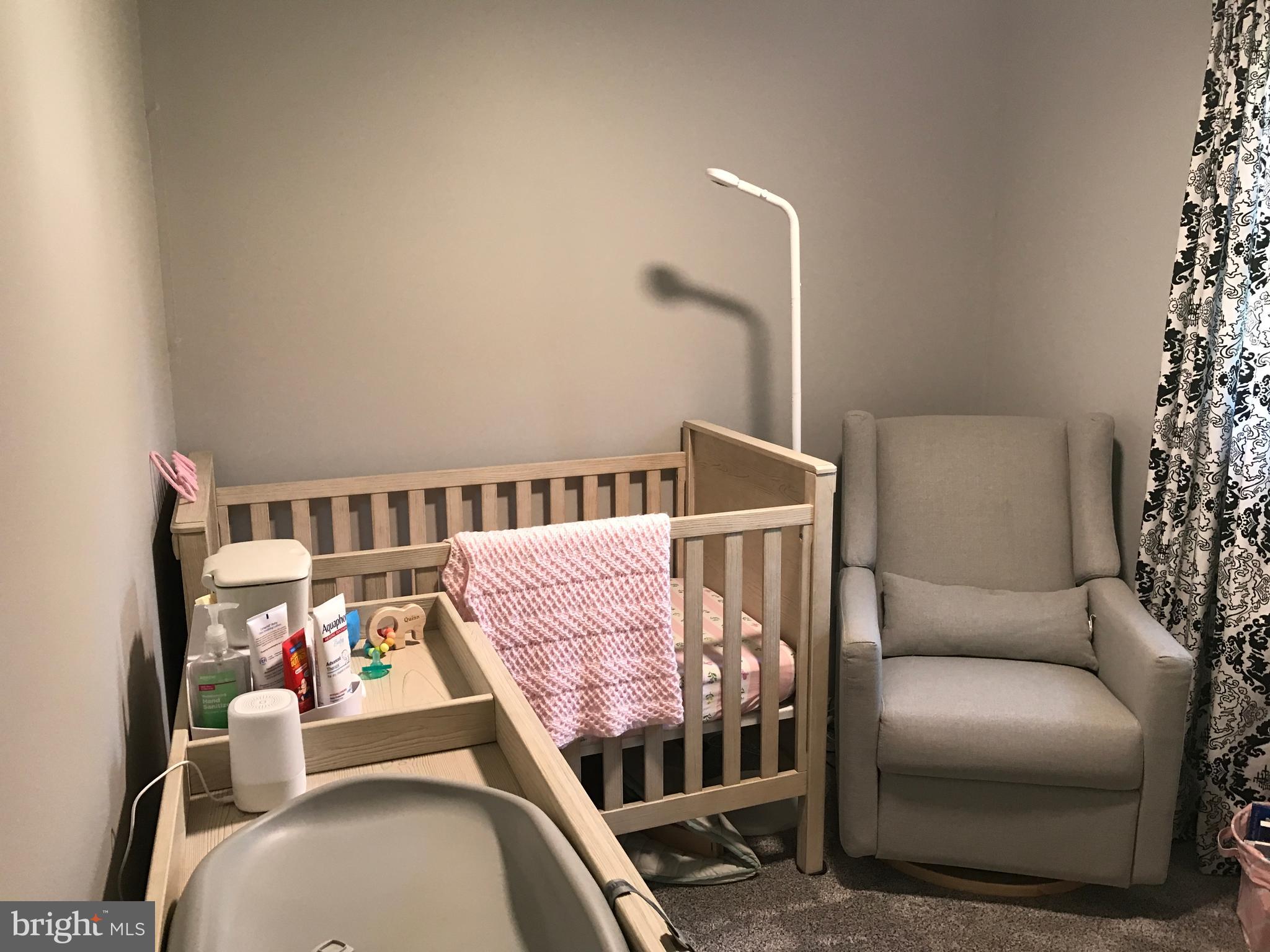 195 River Road Pequea, PA 17565 - Photo 33 of 77 a bedroom with furniture and a baby crib