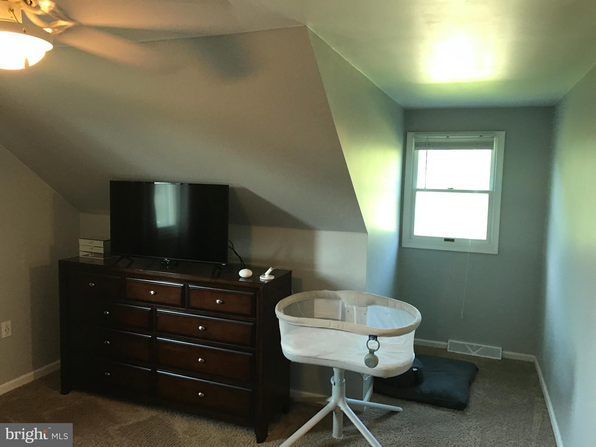 195 River Road Pequea, PA 17565 - Photo 36 of 77 a living room with furniture and a flat screen tv