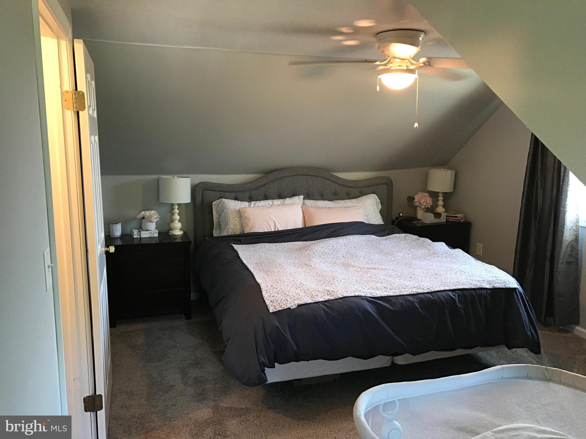 195 River Road Pequea, PA 17565 - Photo 38 of 77 a bedroom with a bed and a window