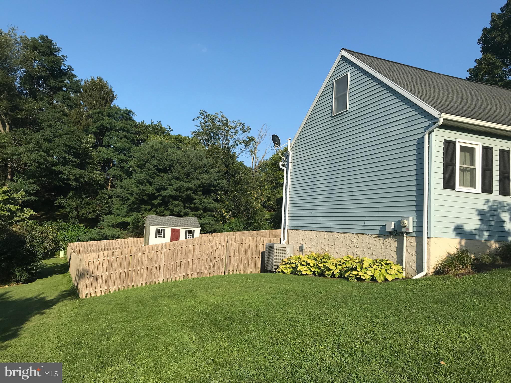 195 River Road Pequea, PA 17565 - Photo 4 of 77 front view of a house with a yard