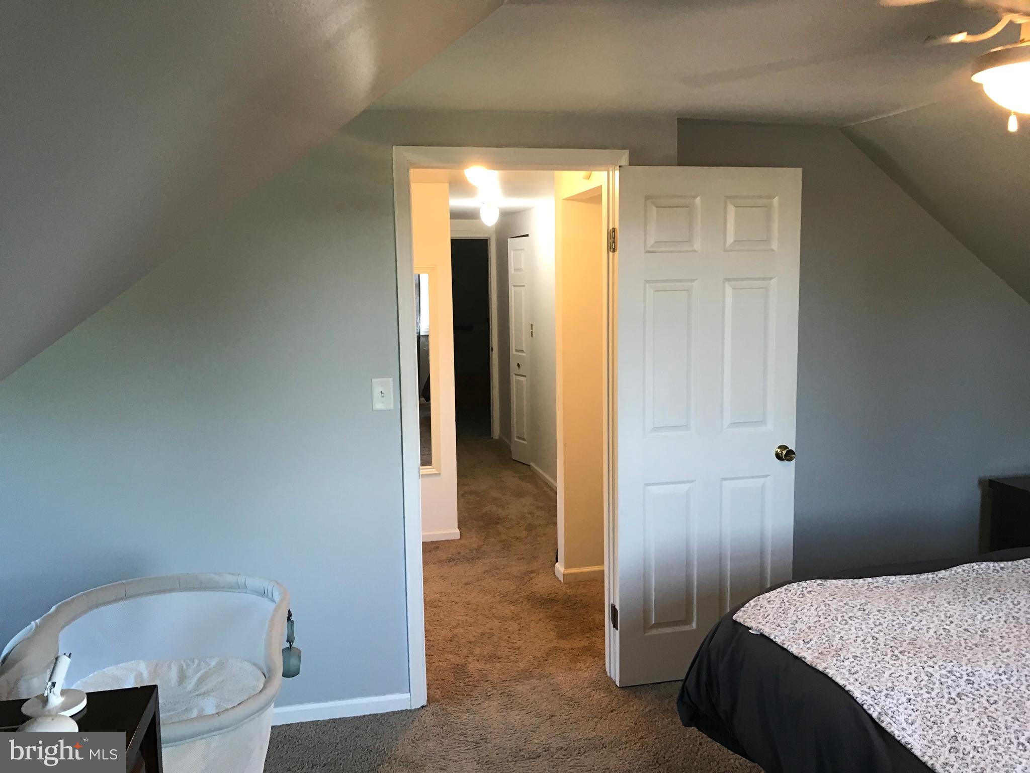 195 River Road Pequea, PA 17565 - Photo 44 of 77 a bedroom with a bed and a table in it